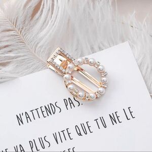 Gold hair clips with white pearls and rhinestones